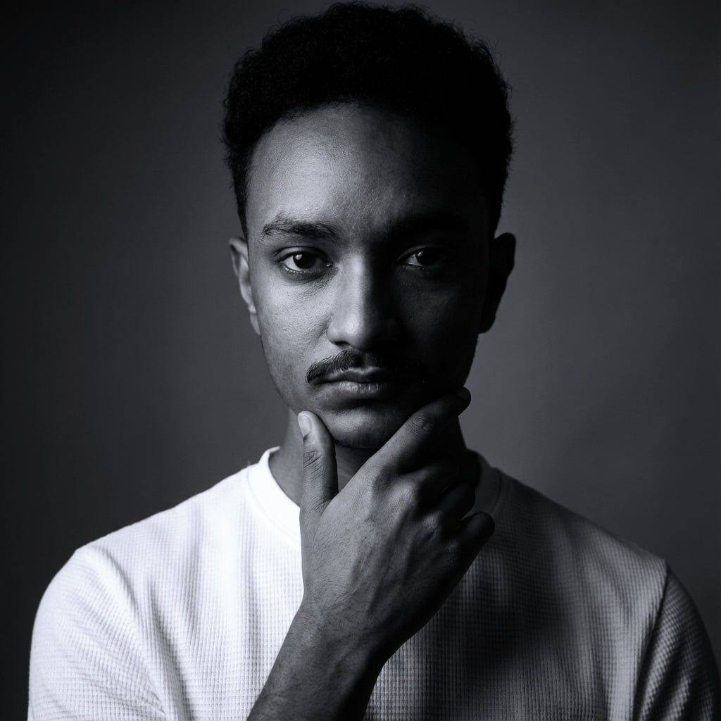 Altayeb, looking off-frame